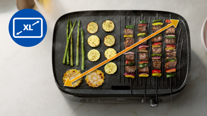 Ampia superficie di cottura al grill per l'intera famiglia