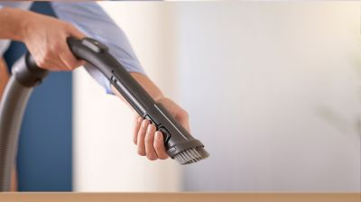 Soft brush integrated into handle, always ready to use