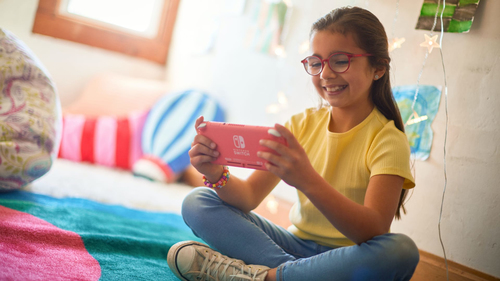 Nintendo Switch Lite (Coral) – Foto 7 van 7