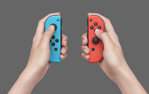 Nintendo Switch OLED Blauw Rood – Foto 10 van 11