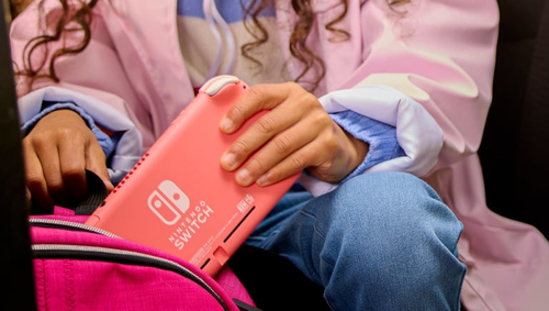 Nintendo Switch Lite (Coral) – Foto 6 van 7